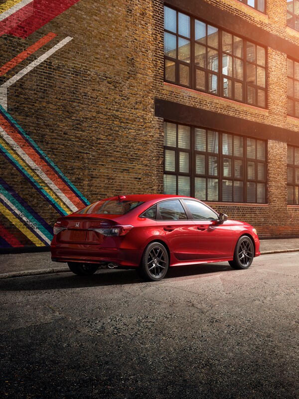 High Cost of Replacing a Car Key | Bobby Rahal Honda | A 2022 Red Honda Civic Parked Outside of a Brick Building