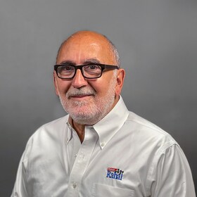 Staff member Gus Photis from ID_f083fd