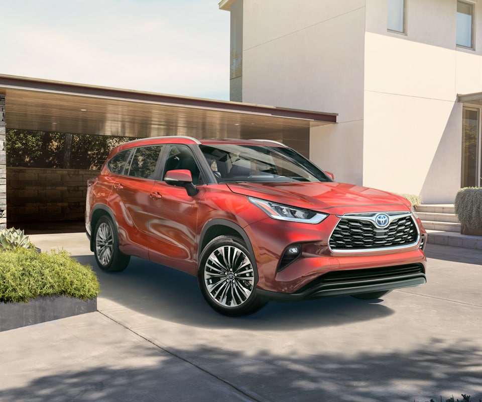 How to prepare your home for your new Plug-in Hybrid Vehicle at Bobby Rahal Toyota in Mechanicsburg, PA | The 2021 Toyota Highlander Platinum Parked in a Spacious Driveway