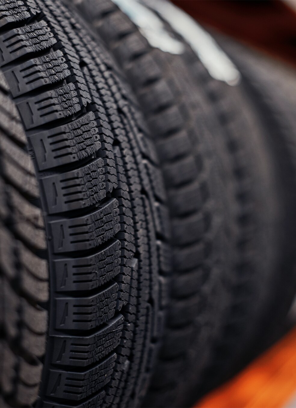 Winter Tires vs. All Season Tires at Bobby Rahal Toyota in Mechanicsburg, PA | Close up of new tires with white sticker on them