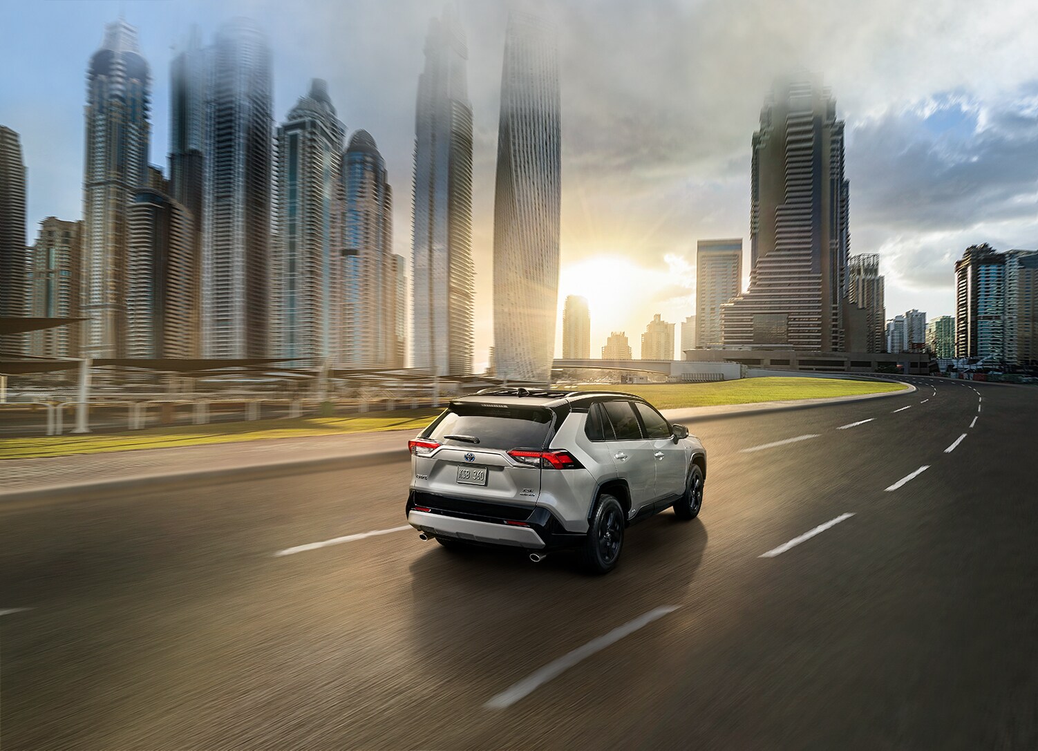 Toyota Hybrid for Everyone at Bobby Rahal Toyota | 2021 Toyota RAV4 Hybrid rear view of driving on highway
