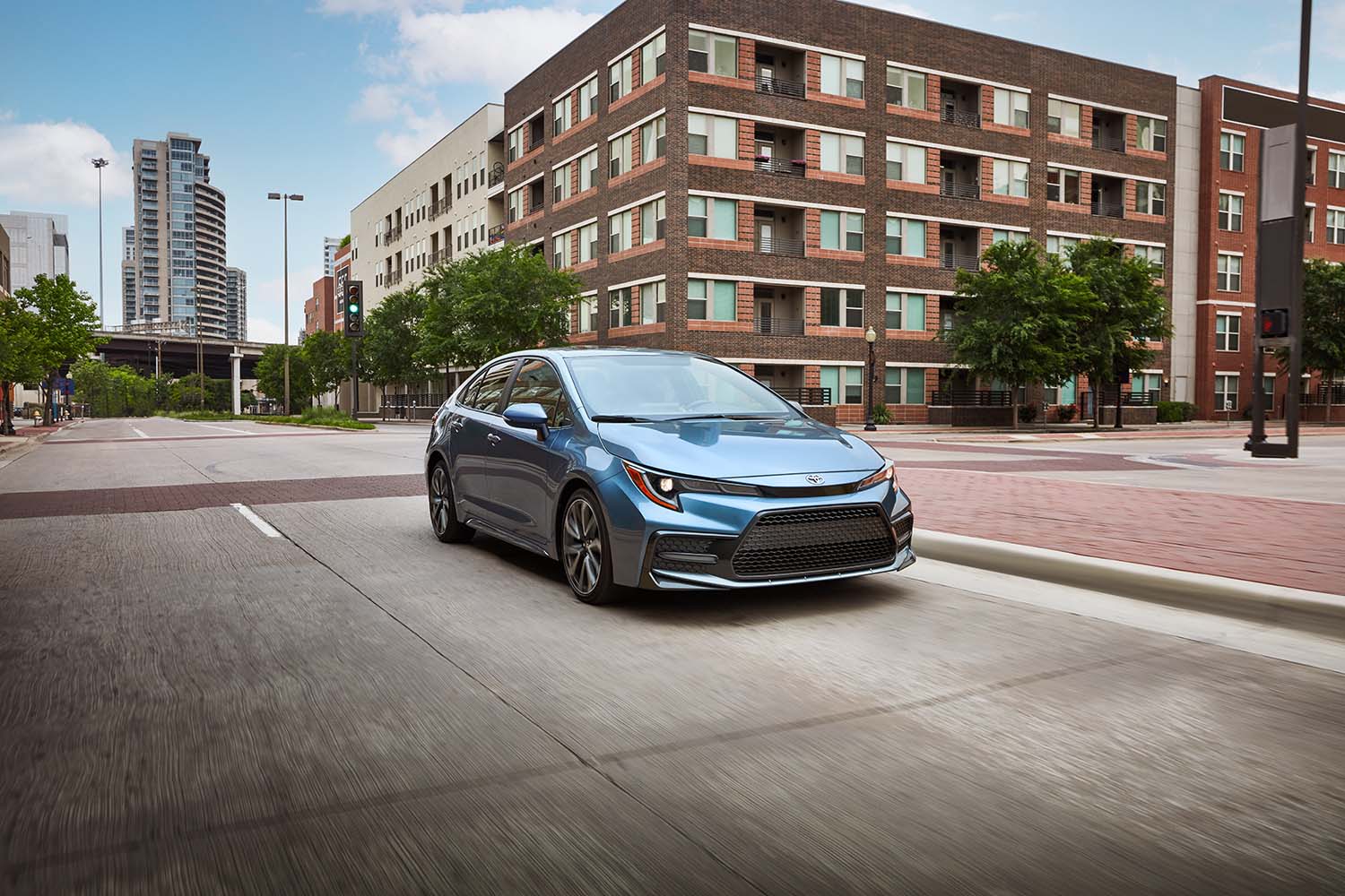 The All-New 2022 Toyota Corolla at Bobby Rahal Toyota in Mechanicsburg, PA | 2022 Toyota Corolla driving through a town