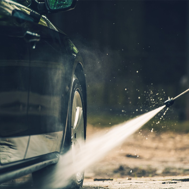 Accessories that help keep your Toyota protected at Bobby Rahal Toyota in Mechanicsburg, PA | Using Pressure Hose to Wash Car