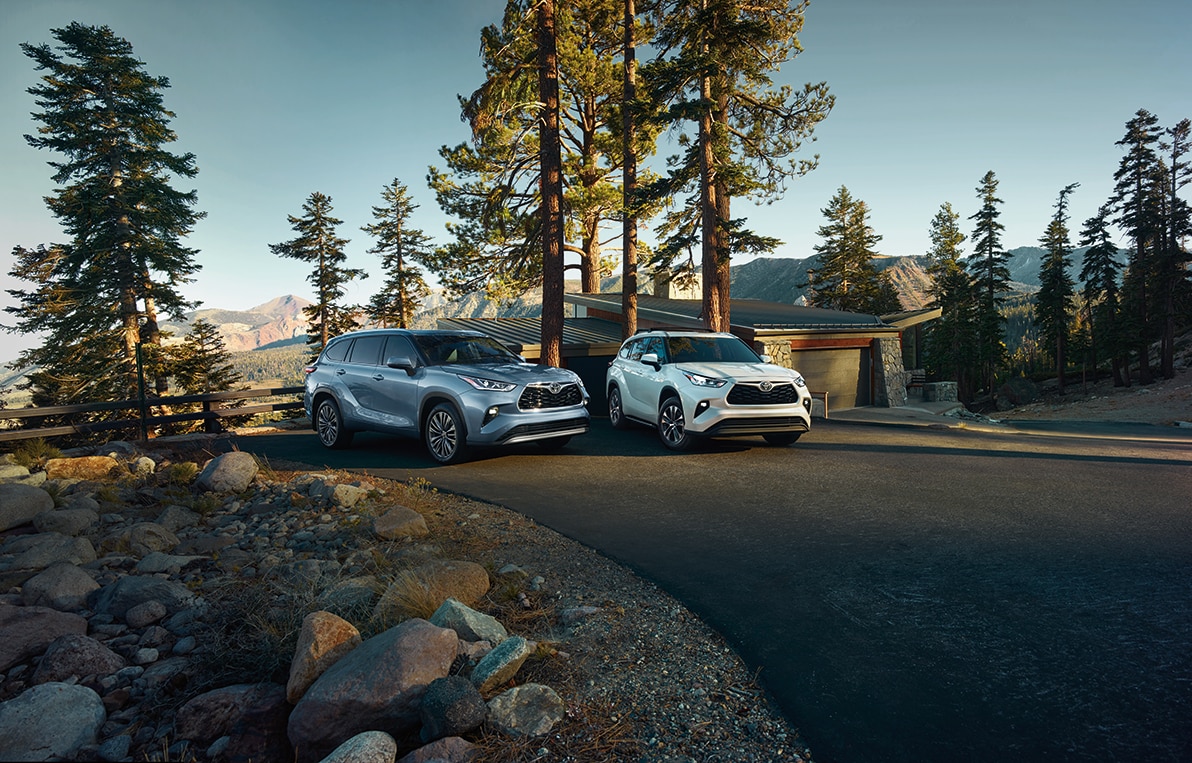 Bobby Rahal Toyota is a Car Dealership near Enola PA | Two 2021 Toyota Highlanders parked in the woods