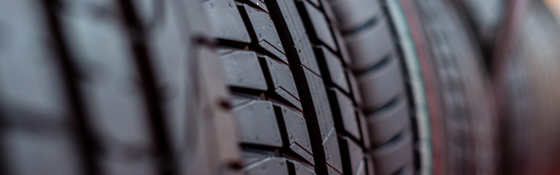How to check your tires' health at Bobby Rahal Toyota of Mechanicsburg | A stack of brand new tires on a rack