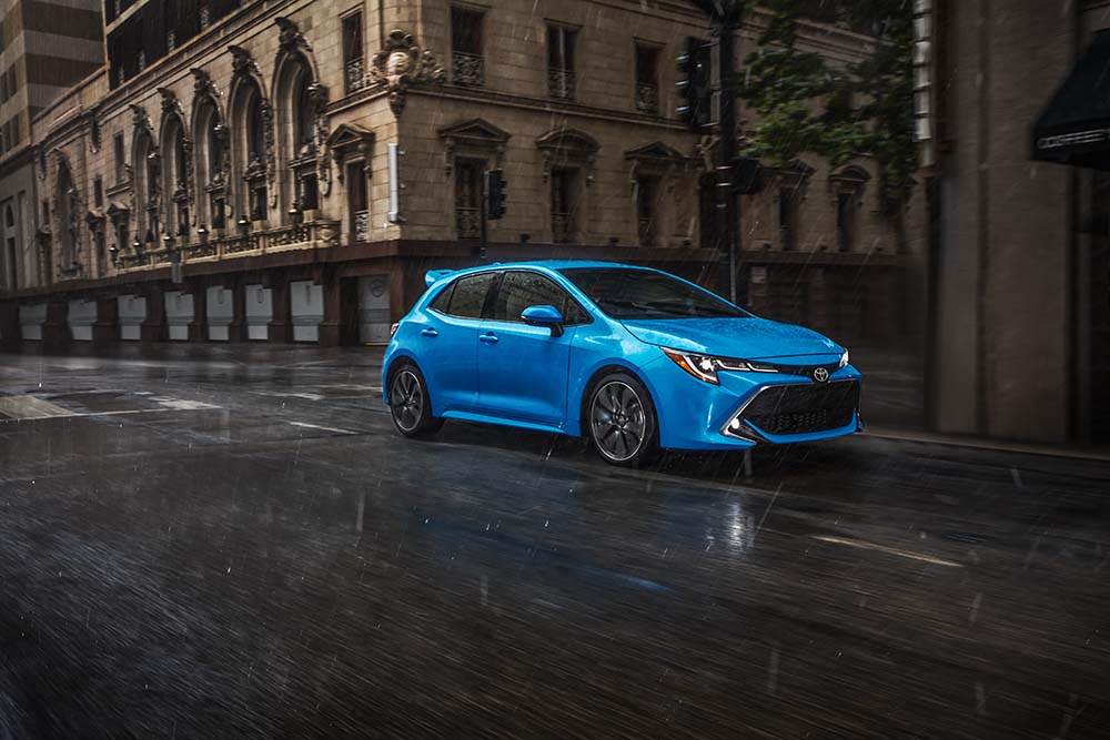 Why drivers should consider an extended warranty on their Toyota at Bobby Rahal Toyota | 2022 Toyota Corolla Hatchback driving through town