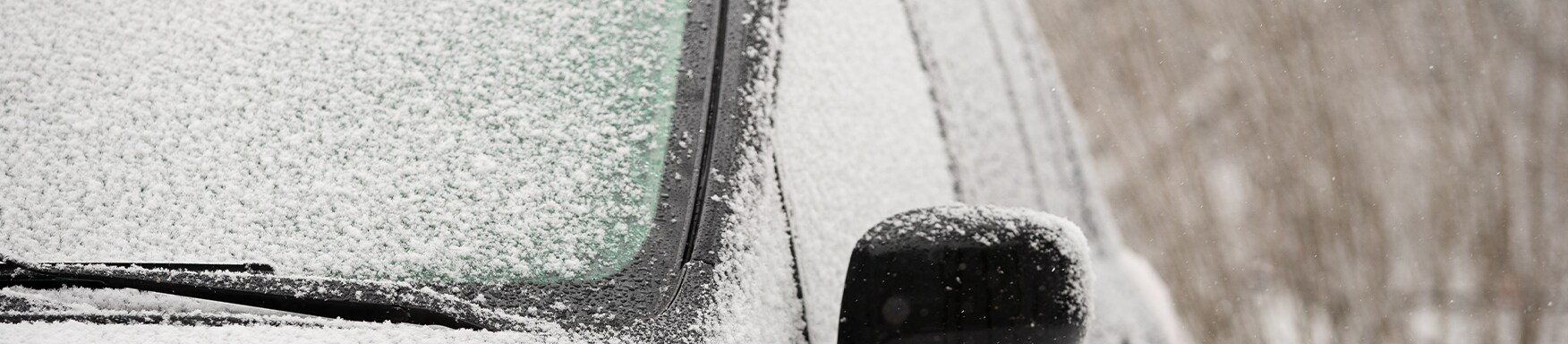 How to Prevent your Vehicle from Fogging Up At  Bobby Rahal Toyota in Mechanicsburg, PA | Black car cover in snow and frozen windshield 