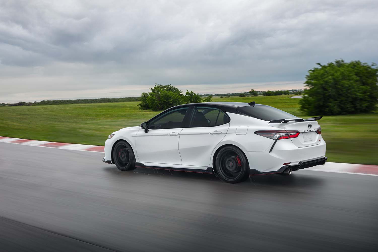 The All-New 2022 Toyota Camry at Bobby Rahal Toyota in Mechanicsburg, PA | White 2022 Toyota Camry driving on the race track