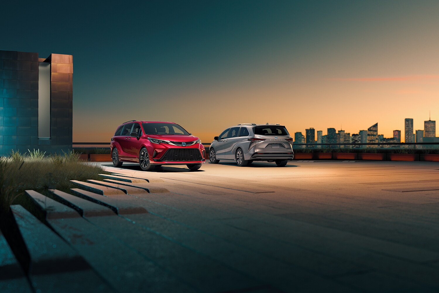 Toyota Hybrid for Everyone at Bobby Rahal Toyota | Two 2022 Toyota Sienna Hybrids parked at night
