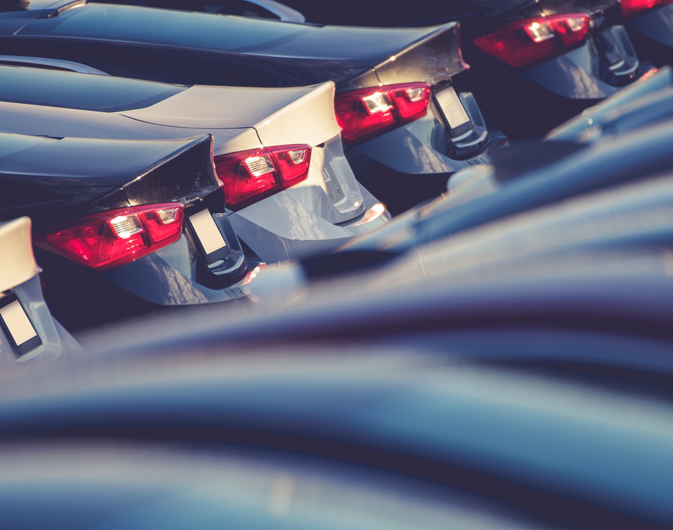 Vehicle Warranty Information at Bobby Rahal Toyota in Mechanicsburg, PA | Parking lot filled with new cars in the color black, grey, and dark grey