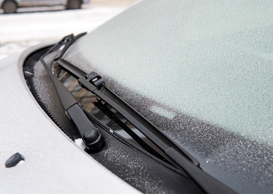 How to Prevent your Vehicle from Fogging Up At  Bobby Rahal Toyota in Mechanicsburg, PA | Frosted car windshield with wiper blades 