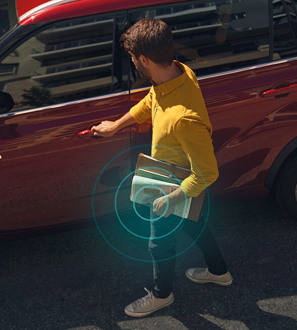Model Features of the 2022 Toyota Highlander Hybrid at Bobby Rahal Toyota | Key Sensor on Door Locks of Red 2022 Highlander Hybrid
