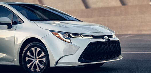 Compare the 2022 Toyota Corolla vs. the 2021 Subaru Impreza at Bobby Rahal Toyota | Close up on Corolla's front