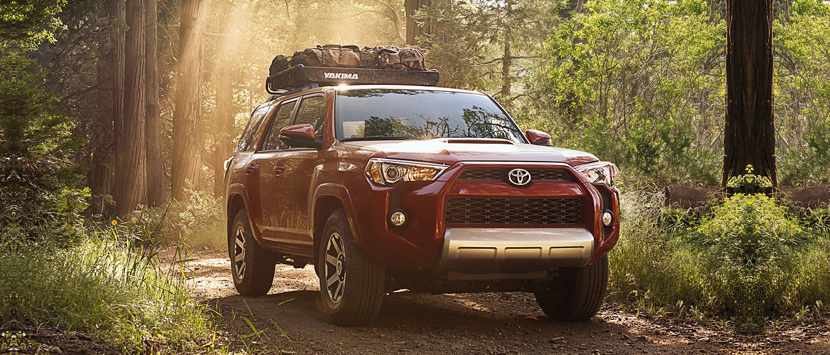 FRN_MY19_Woods_Red.jpg Red 4Runner driving in the woods