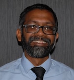 Staff member Mo Somwara from ID_e46719