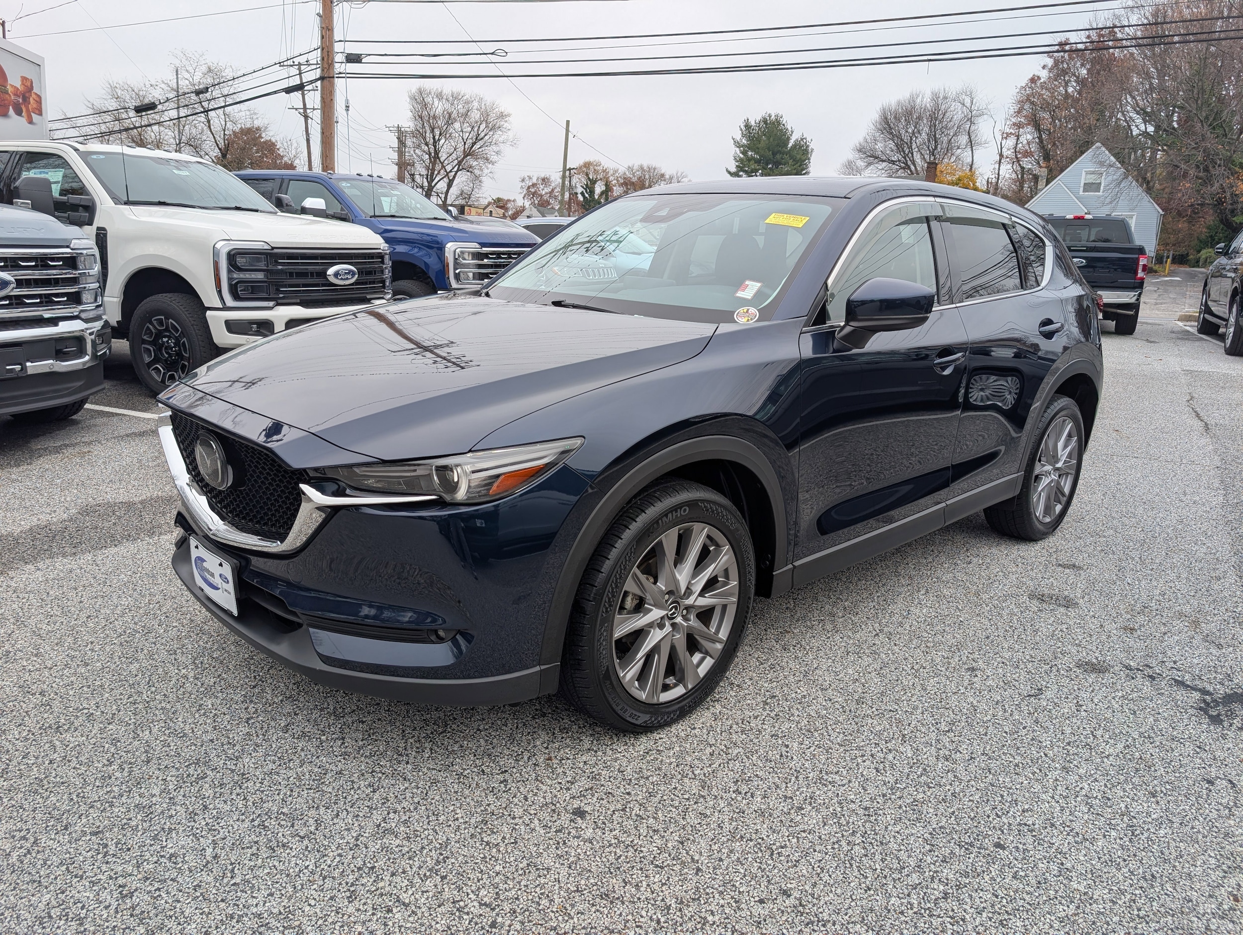 Certified 2021 Mazda CX-5 Grand Touring with VIN JM3KFBDMXM0433001 for sale in Parkville, MD