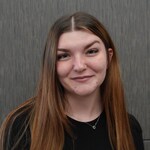 Staff member Kara Busch  from ID_f066d202e1bd