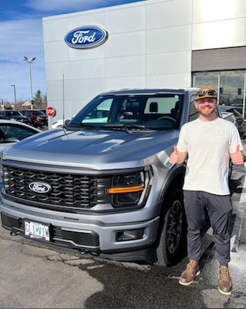 Happy%20Dealership%20Customer%20Near%20Ballwin.png