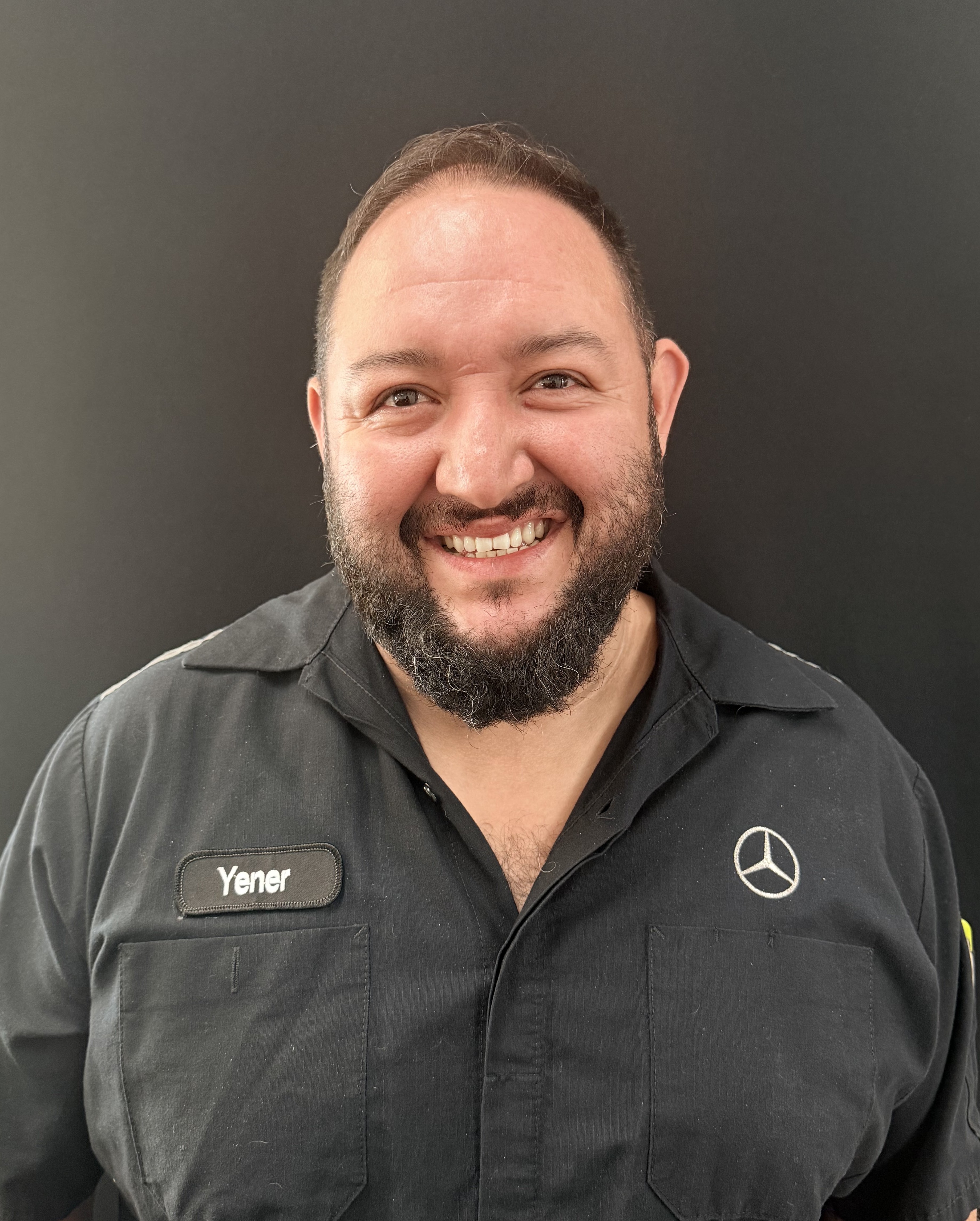 Staff member Yener Deleon from 4d68d33951ed