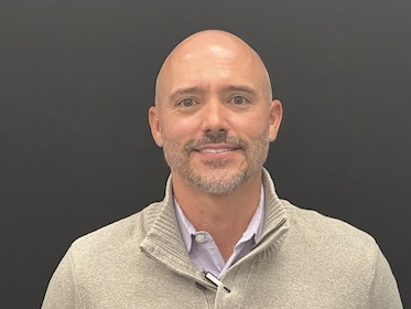 Staff member Brandon Burris from 4d68d33951ed