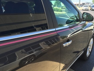 Susan G. Komen For The Cure Pinstriping on passenger side of car