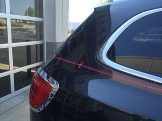 Susan G. Komen For The Cure Pinstriping on rear corner of car