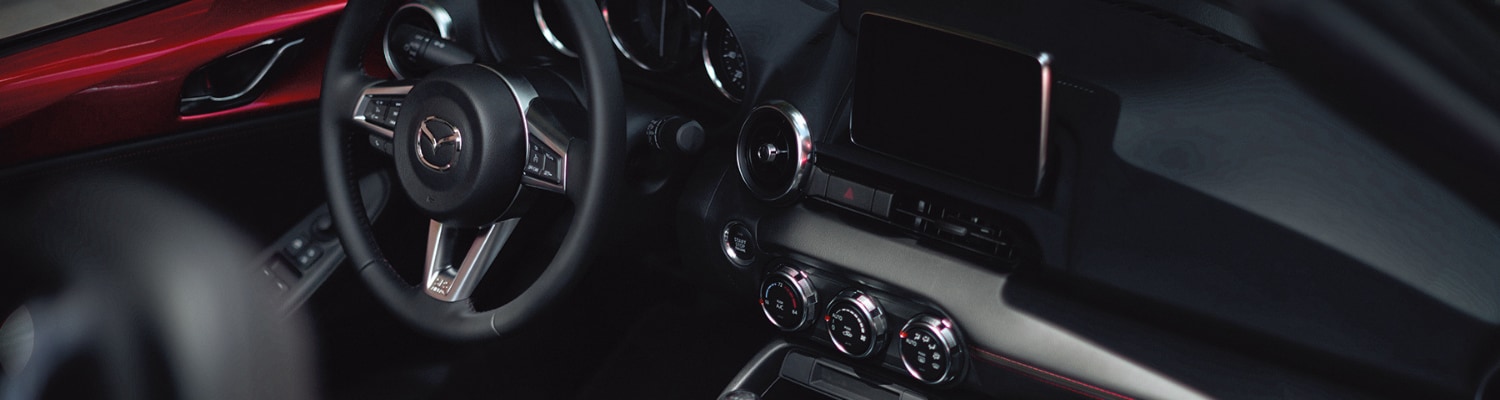 Interior view of the dashboard in a 2019 Mazda Miata