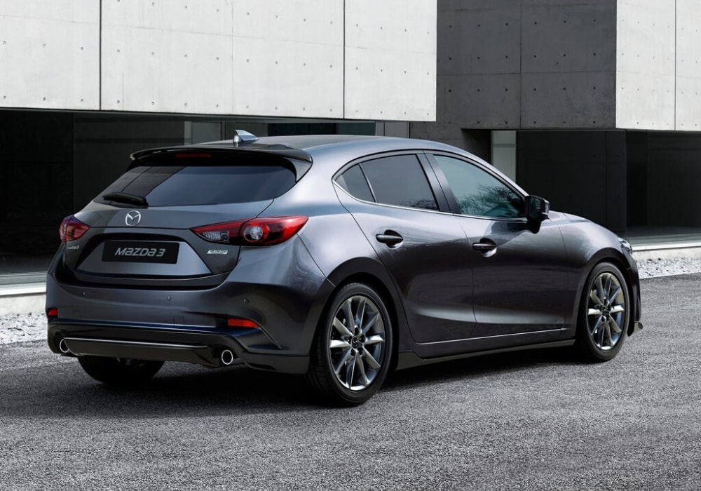 Rear exterior design view of the 2017 Mazda3 hatchback in gray color