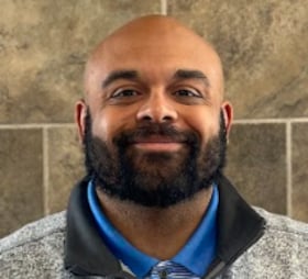 Staff member Alex Bond from 7d6e7ab2bdc5