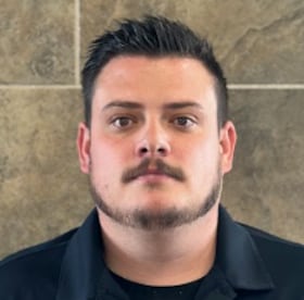 Staff member Garrett Shuler from 7d6e7ab2bdc5