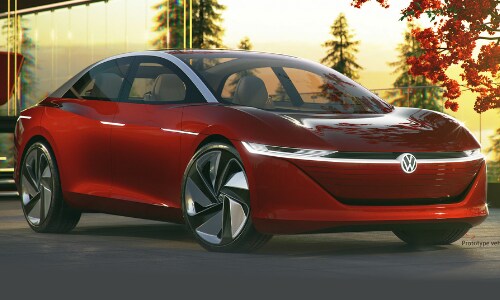 New VW ID. VIZZION autonomous electric car concept in red ground level view at sunset