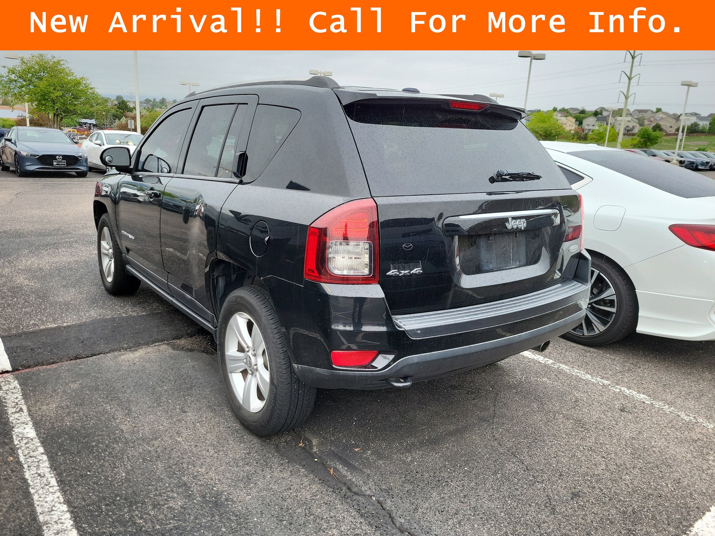 Used 2014 Jeep Compass Latitude with VIN 1C4NJDEB9ED630149 for sale in Colorado Springs, CO