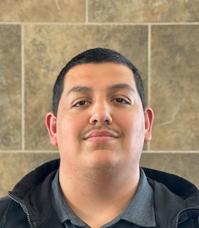 Staff member Isaac Estrada from c1685eef8d11