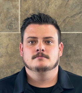 Staff member Garrett Shuler from b87b2f55e7a2