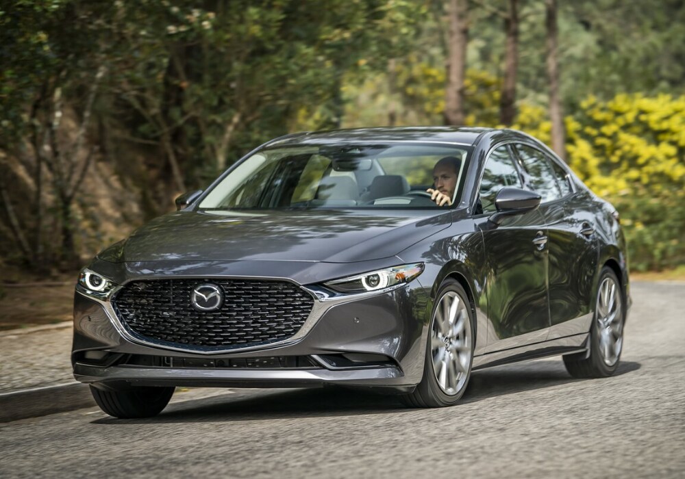 should i buy a mazda 3 or subaru impreza