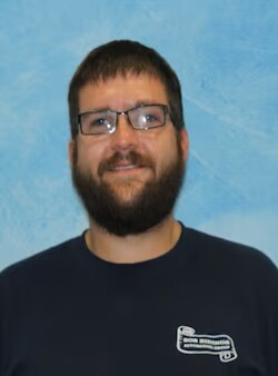 Staff member Justin Wilbur from 3a0bd427107c