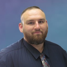 Staff member Corey Grinkey from 6204f1ae628b