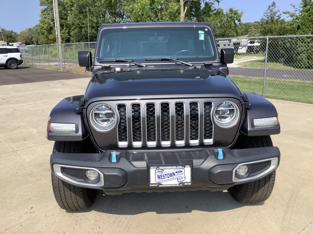 Used 2021 Jeep Wrangler Unlimited Sahara 4XE with VIN 1C4JJXP68MW699028 for sale in Jacksonville, IL