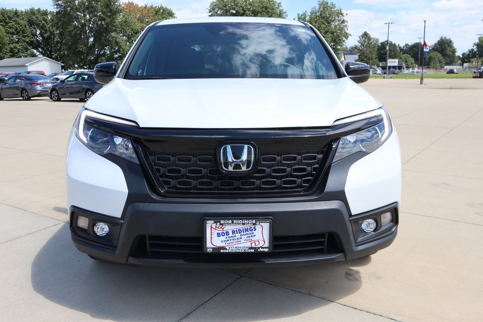 Used 2021 Honda Passport Sport with VIN 5FNYF8H27MB015933 for sale in Taylorville, IL