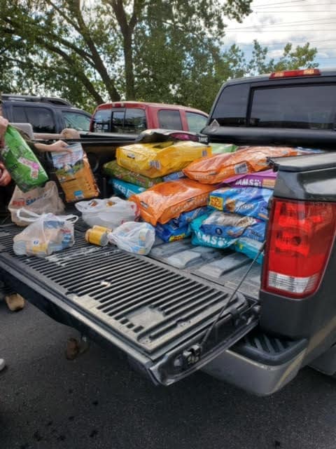 Pet food in truck bed before heading to Safe Harbor Humane Society