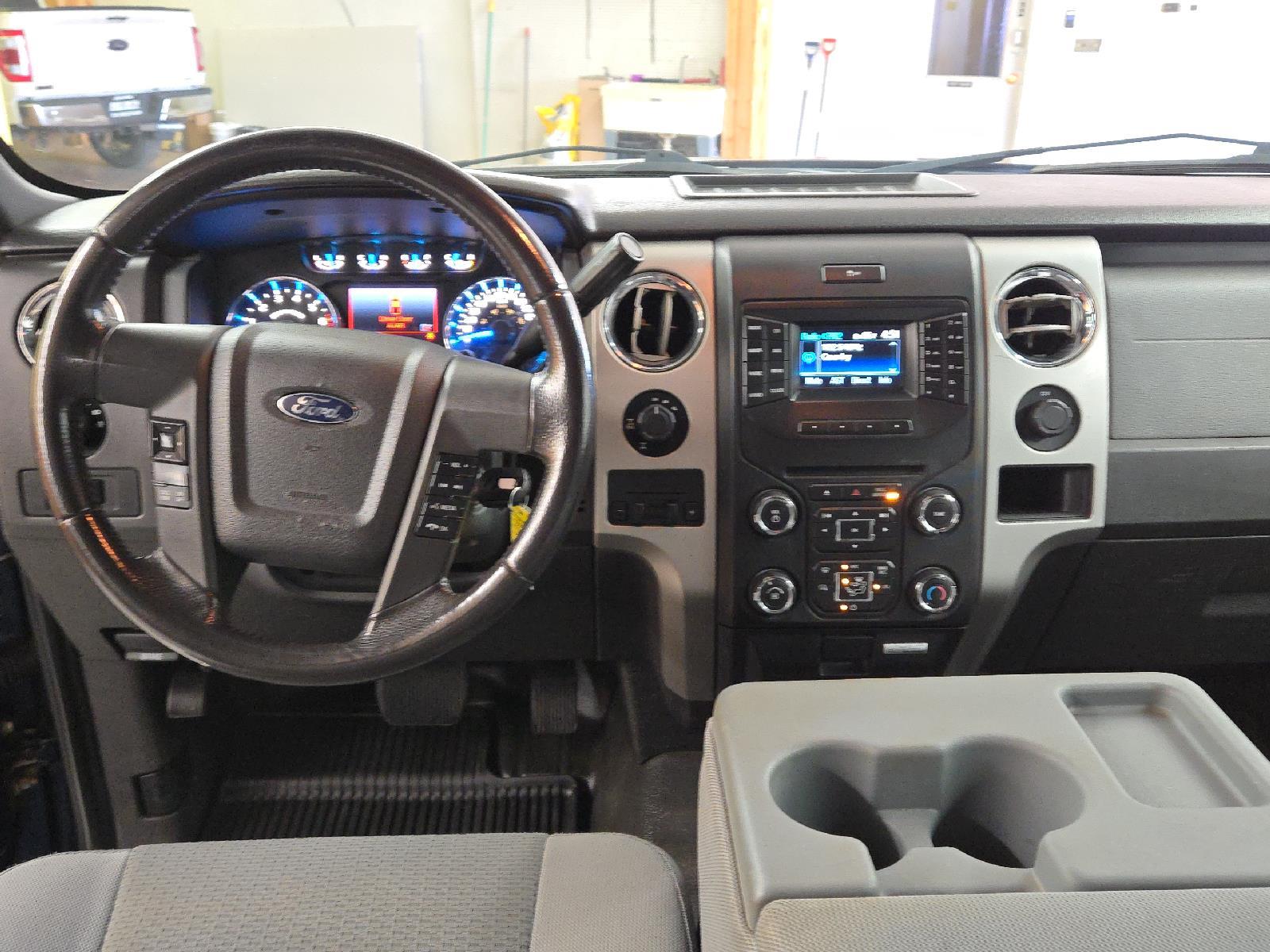 Used 2014 Ford F-150 XLT with VIN 1FTFW1EF0EFC19072 for sale in Hardin, MT