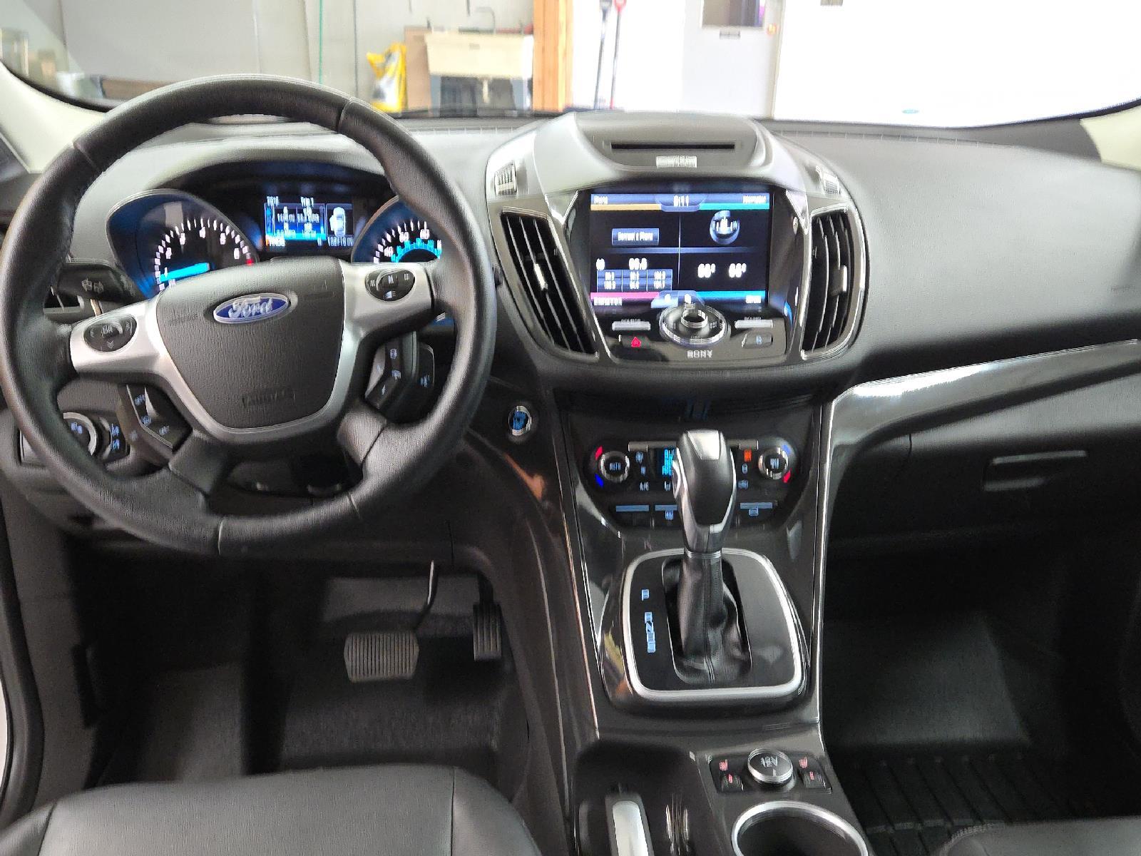 Used 2014 Ford Escape Titanium with VIN 1FMCU9JX7EUB32475 for sale in Hardin, MT