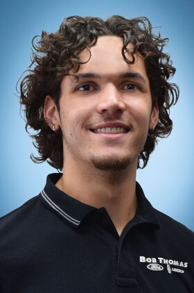 Staff member Aiden Lewis from ID_c39358083c13