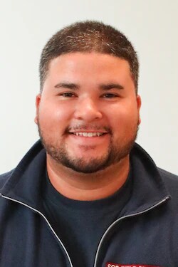 Staff member Brandon Crespo from 9c5c3dd95d35