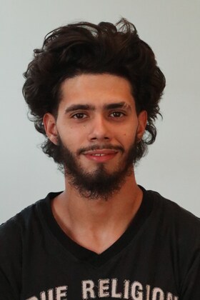 Staff member Angel Cruz from 9c5c3dd95d35