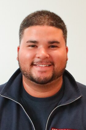 Staff member Brandon Crespo from 9c5c3dd95d35