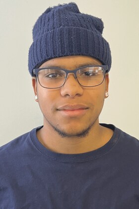 Staff member Neithan Mejia from 9c5c3dd95d35