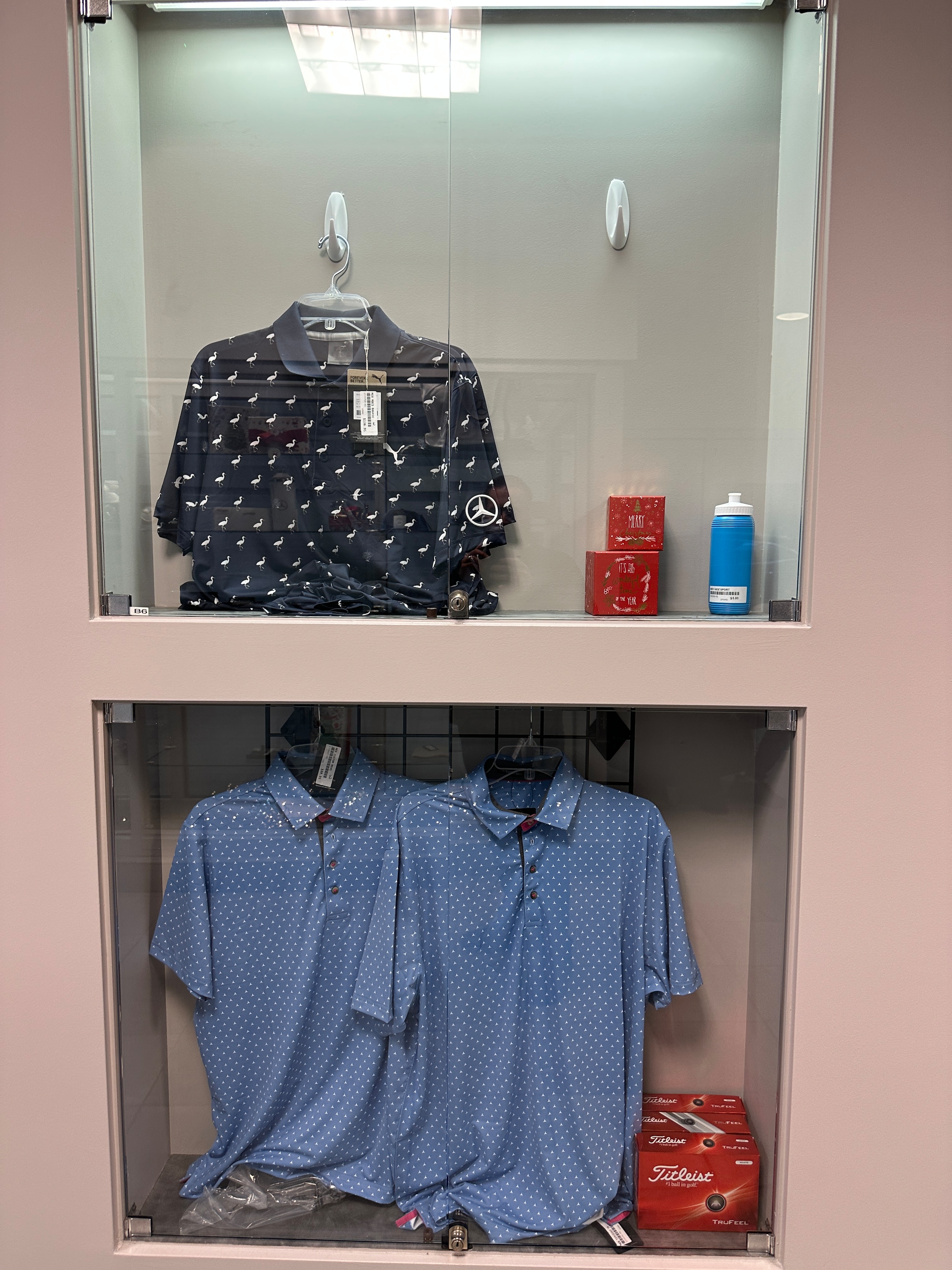 Patterned Mercedes-Benz polo shirt in display case