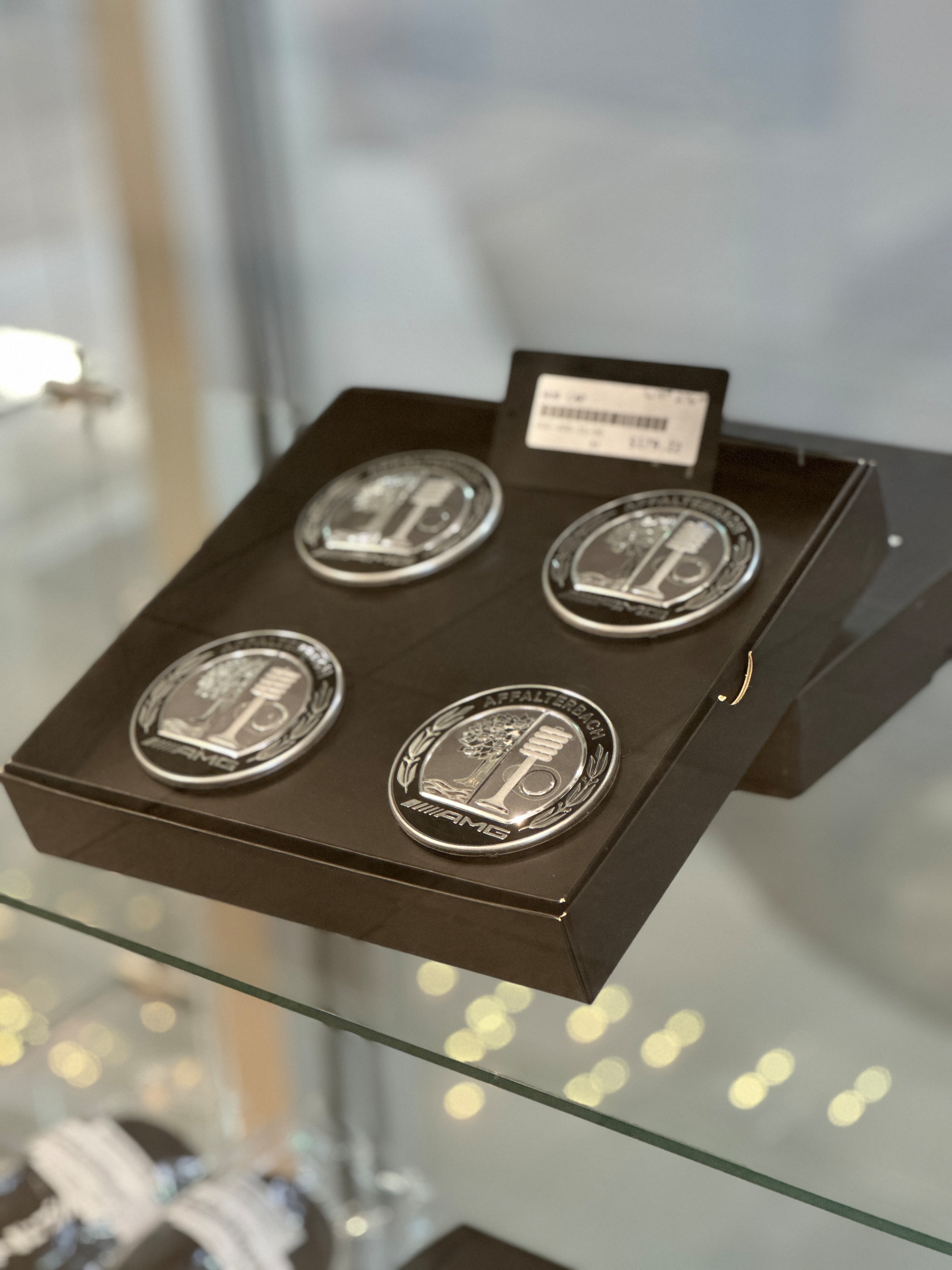 AMG wheel center caps gift box in display case
