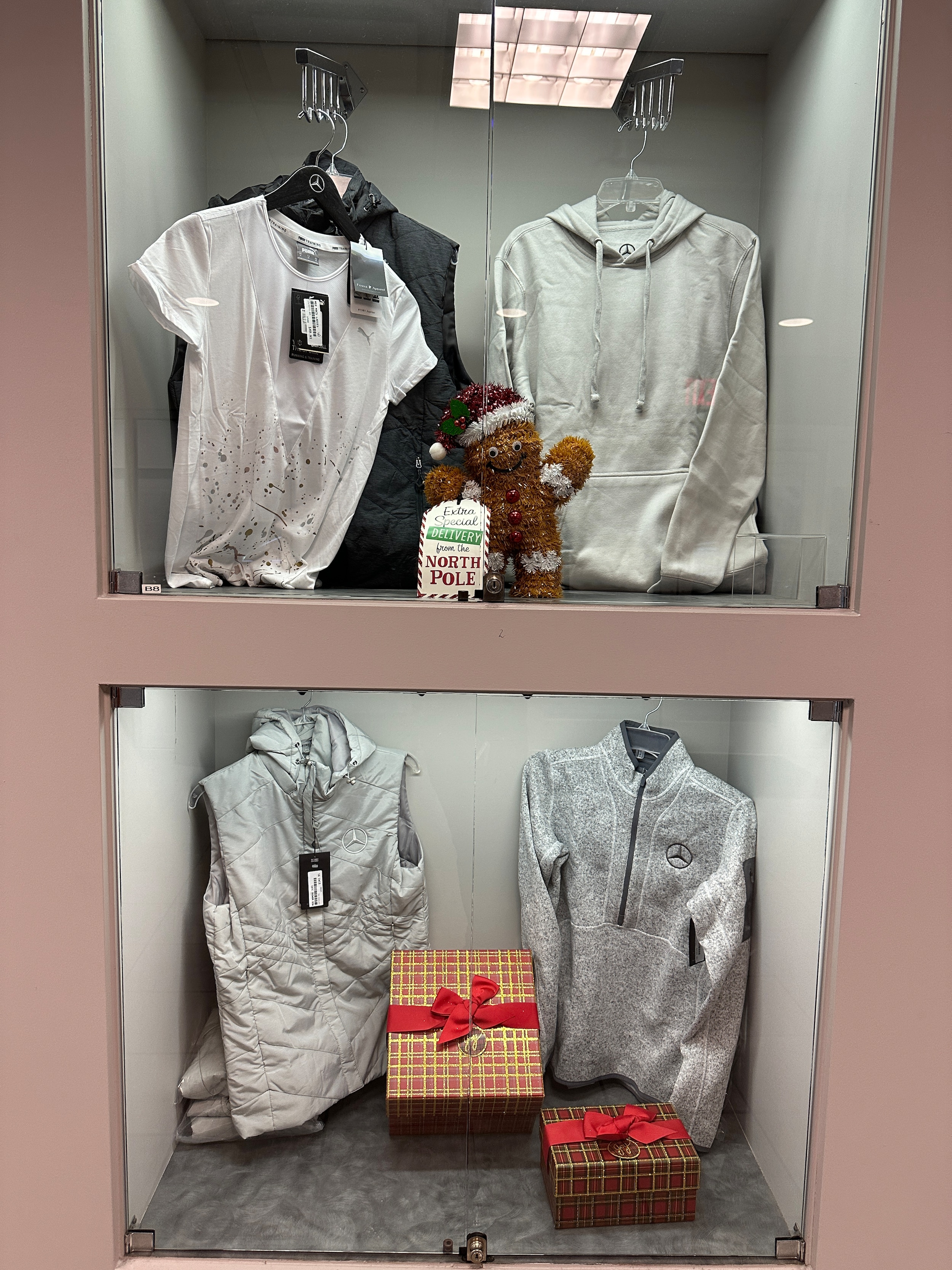 Mercedes-Benz women’s tee and vest in holiday display